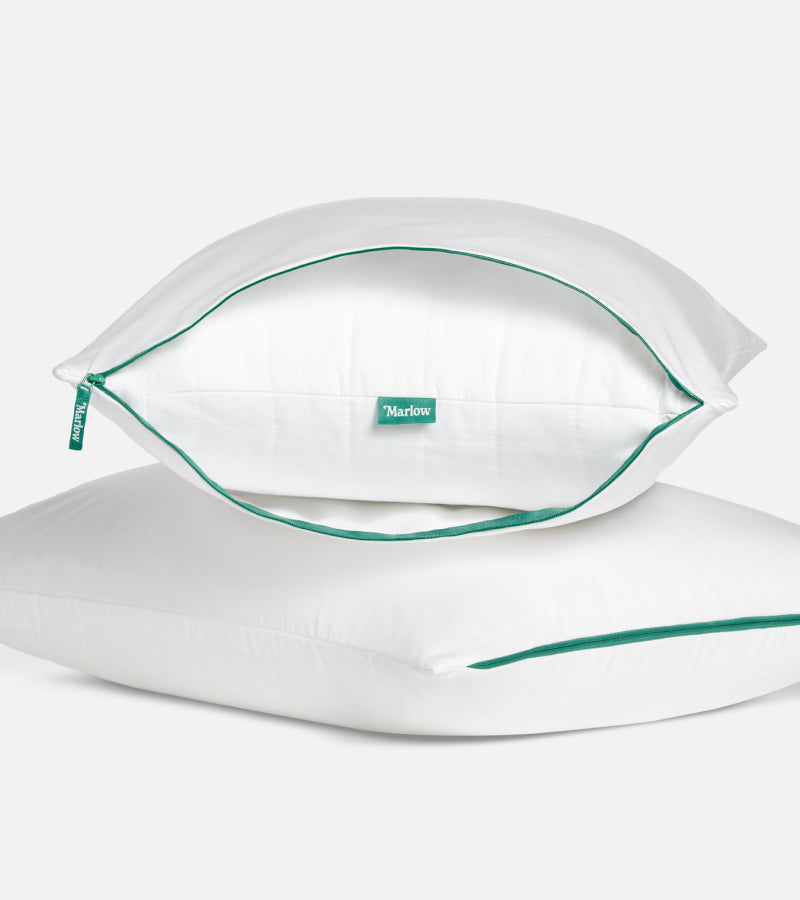 Two stacked Marlow Pillows zipped into Marlow Pillow Protectors
