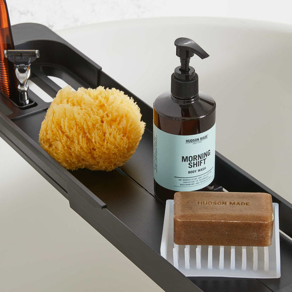 Soap dish with drain and cover clearance