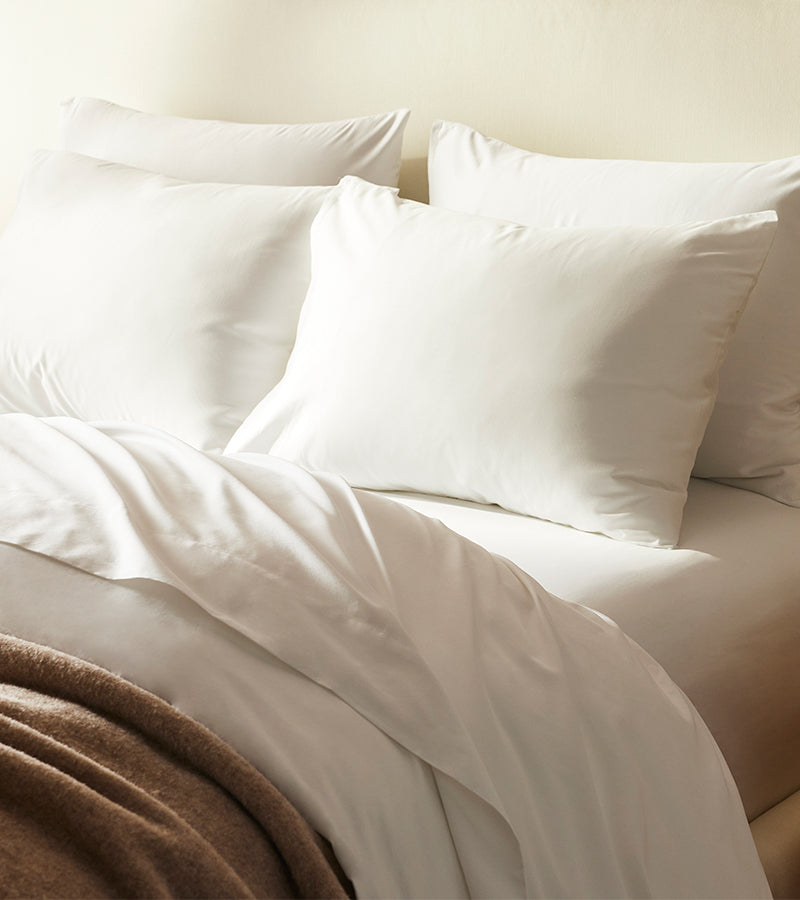 Brooklinen sheets on a bed