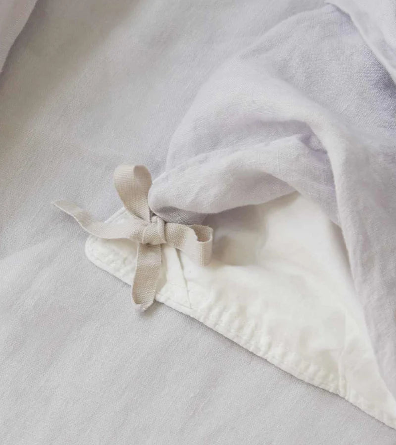 Our duvet ties pair with comforter loops so all four corners stay secured all night.
