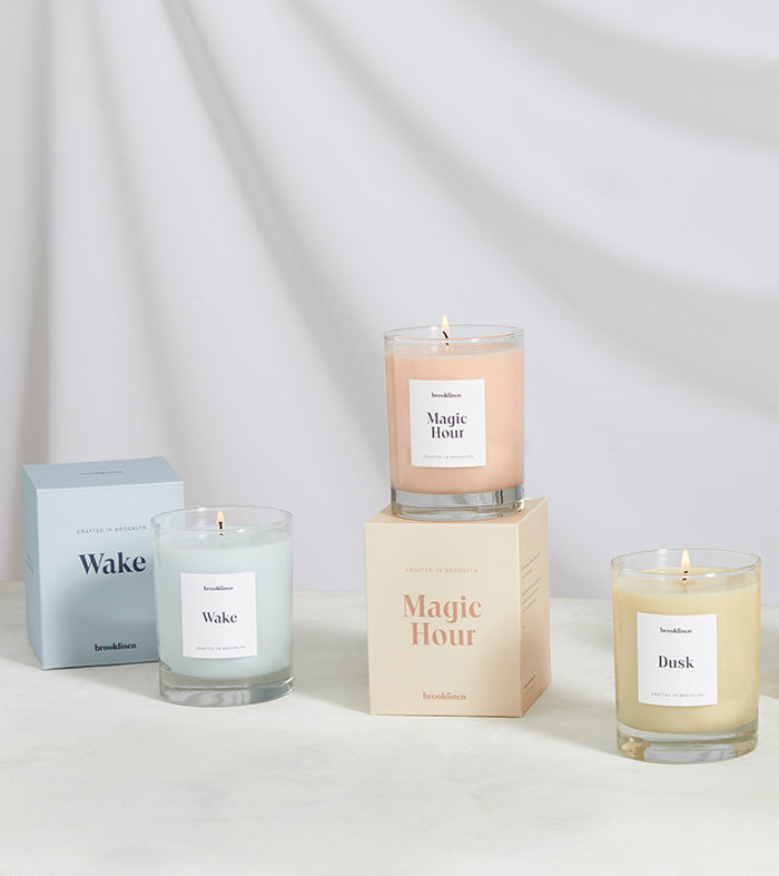 Three Candles with items that make up their scents