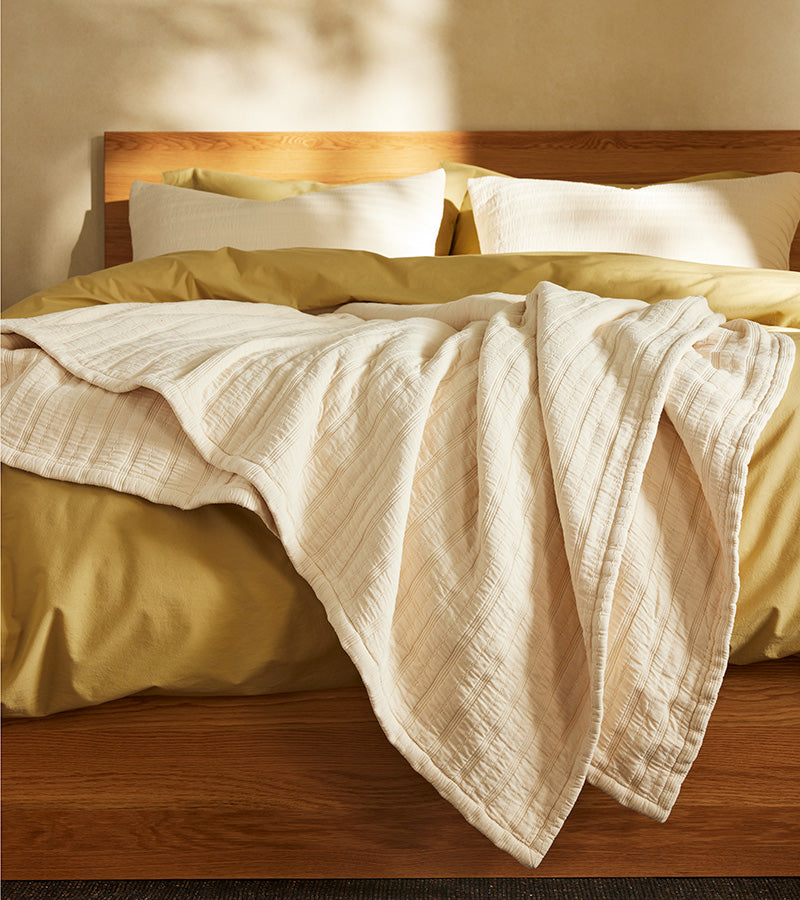 This lightweight luxury is cozy, brushed for softness, but won’t overheat you down when snuggling.