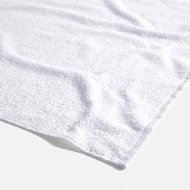 Fast-drying Ultralight Bath Sheets in White by Brooklinen - Holiday Gift Ideas