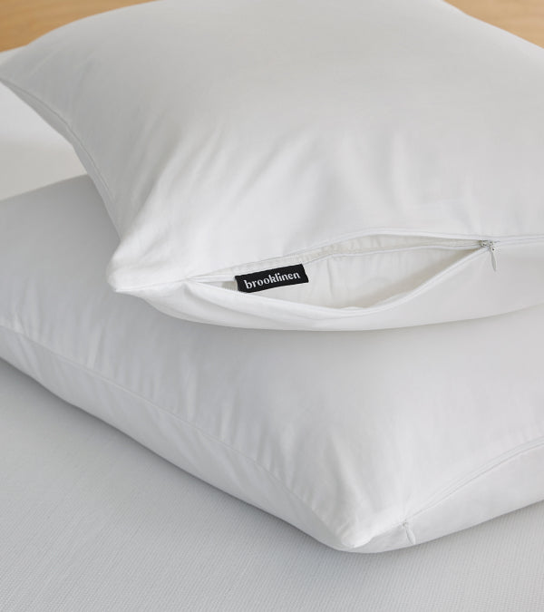 Two pillows in mattress toppers